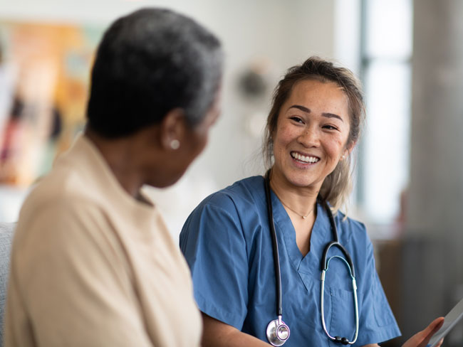 medical professional talking with patient